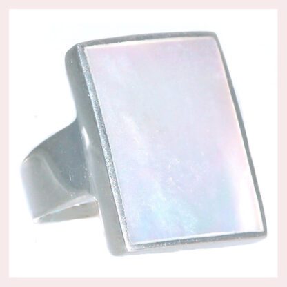 A Sterling Silver White Mother of Pearl Ring on a white background with a sterling silver band.