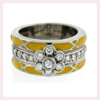 A Sterling Silver Ring with Yellow Enamel & CZ Flower.