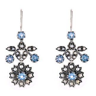 A pair of Art Nouveau Floral Garnet & Seed Pearl Earrings adorned with blue crystals.