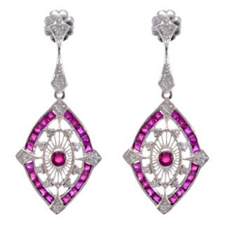 A stunning pair of Art Deco Ruby & Diamond earrings embellished with pink and white diamonds.
