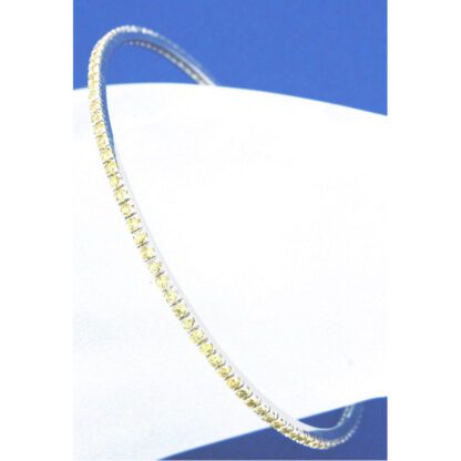 A Blue Sapphire 3.50TW 14KT White Gold bangle bracelet on a white background.