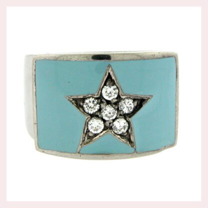 A Sterling Silver Ring with Light Blue Enamel & CZ Star with sterling silver embellishments.