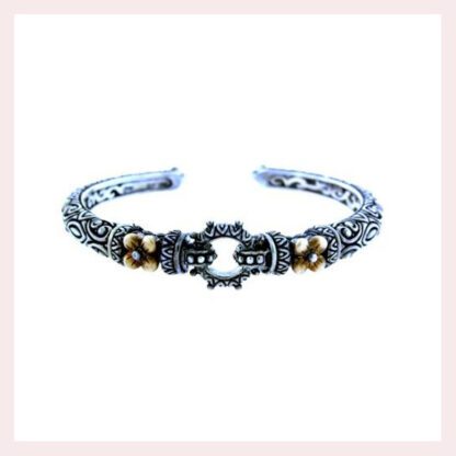A Barbara Bixby Couture Flower Cuff Bracelet Sterling/18K with an ornate design.