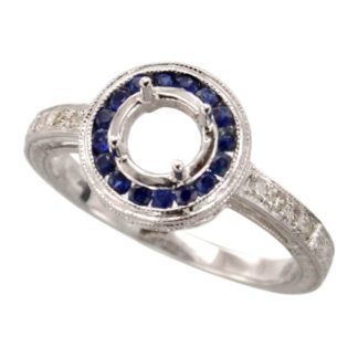 A Halo Semi Mount with Sapphire & Diamonds 14KT in 14KT white gold.