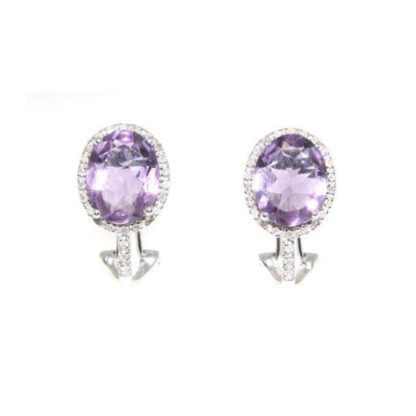 A pair of purple amethyst and diamond earrings.