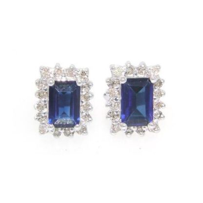 A pair of Blue Sapphire & Diamond Earrings in 14KT White Gold, crafted in 14KT gold.