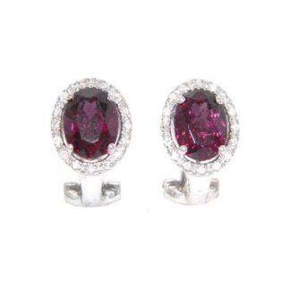 A pair of Diamond Halo Pink Tourmaline earrings in 14KT gold.