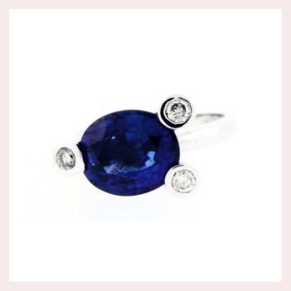 An Sapphire & Diamond Ring in 14KT White Gold.