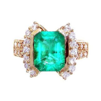 A Unique Columbian Emerald & Diamond Ring 14KT.