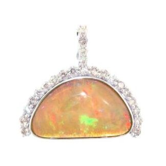 An oval shaped opal and diamond pendant.