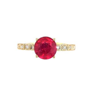 An oval Round Emerald, Ruby & Sapphire & Diamond ring in 14KT Gold.