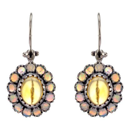 A pair of Vintage Cabochon Earrings with Opal Halo in Platinet with yellow crystals.