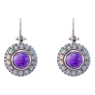 Dangle earrings with a stunning opal accent and silver detailing.