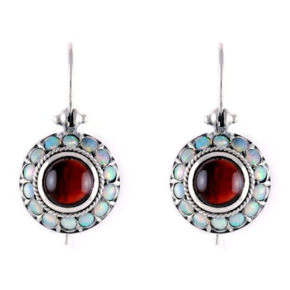 A pair of Dangle Earrings with Cabochon Amethyst, Garnet & Opals in Platinet with a garnet stone.