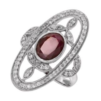 An Art Nouveau Ring with Ruby & Diamonds in 14KT Gold set.