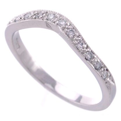 A Curved Diamond Band in 14KT White Gold.