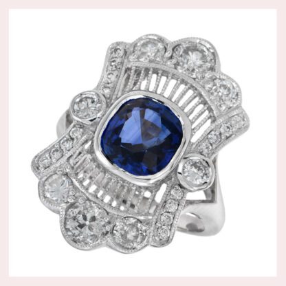 A Vintage Filigree Sapphire & Diamond Ring in 14KT Gold crafted in 14KT white gold.