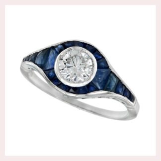 A blue sapphire and diamond ring.