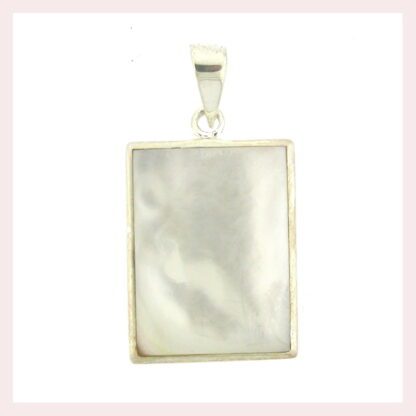 A white mother of pearl pendant on a white background.