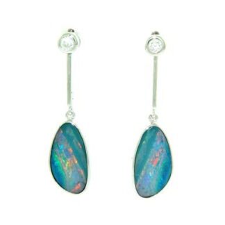 Dangle Opal Earrings with Diamonds 14KT Gold and diamond dangle earrings.