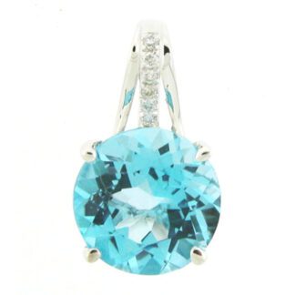 A pedant with a blue topaz and diamonds.